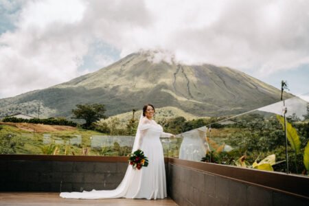bride with volcano arenal at the back