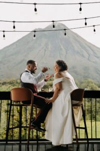 couple enjoying cake at la fortuna volcano arenal